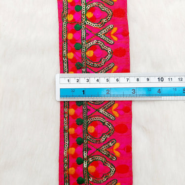 Deep Pink Fabric Trim With Green, Fuchsia Pink, Red And Orange Embroidery and Gold Sequins